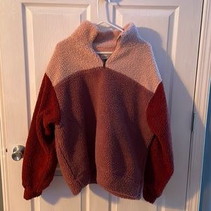 Multi colored fluffy hoodie. Very comfortable and warm. Size XL